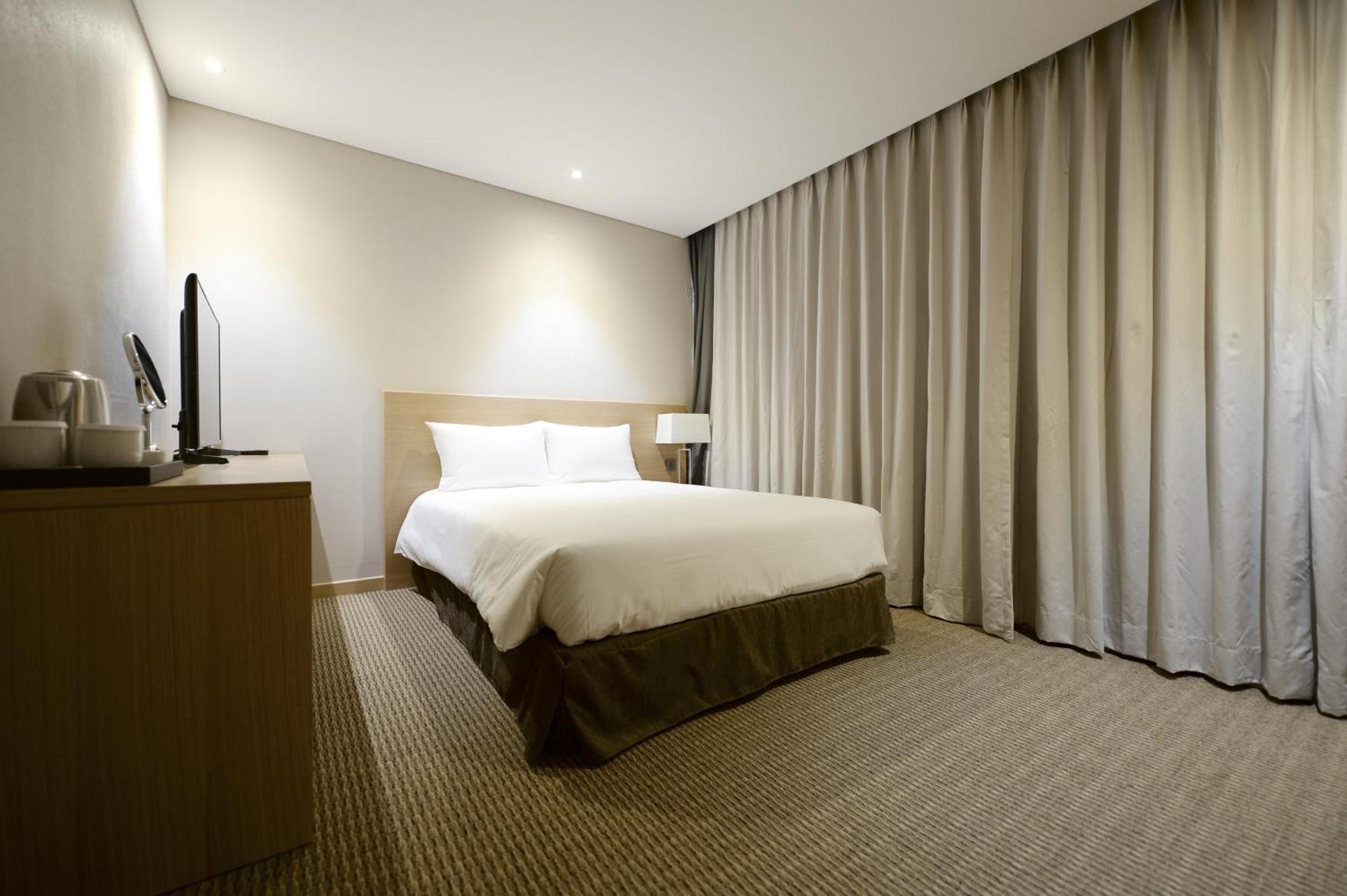 Hotel New Oriental Myeongdong Szöul Szoba fotó