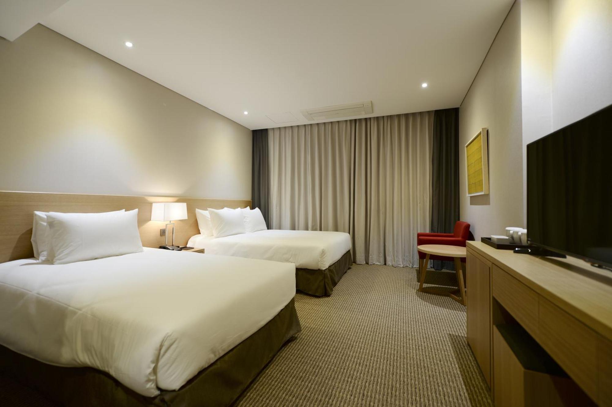 Hotel New Oriental Myeongdong Szöul Szoba fotó