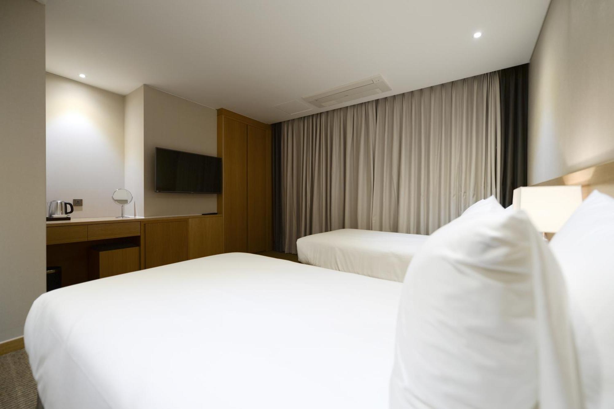 Hotel New Oriental Myeongdong Szöul Szoba fotó