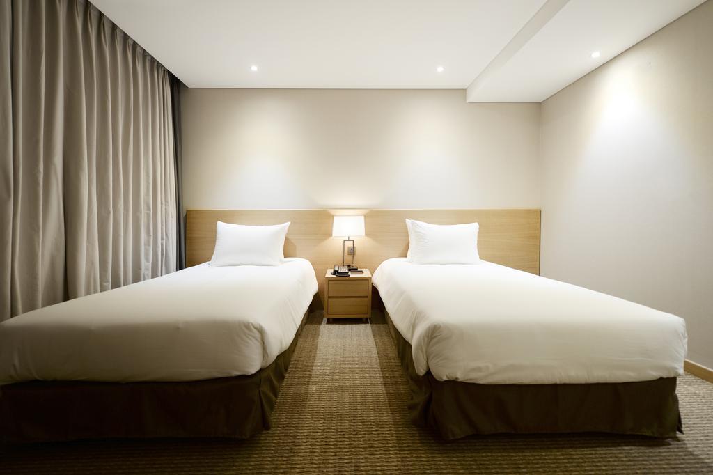 Hotel New Oriental Myeongdong Szöul Szoba fotó